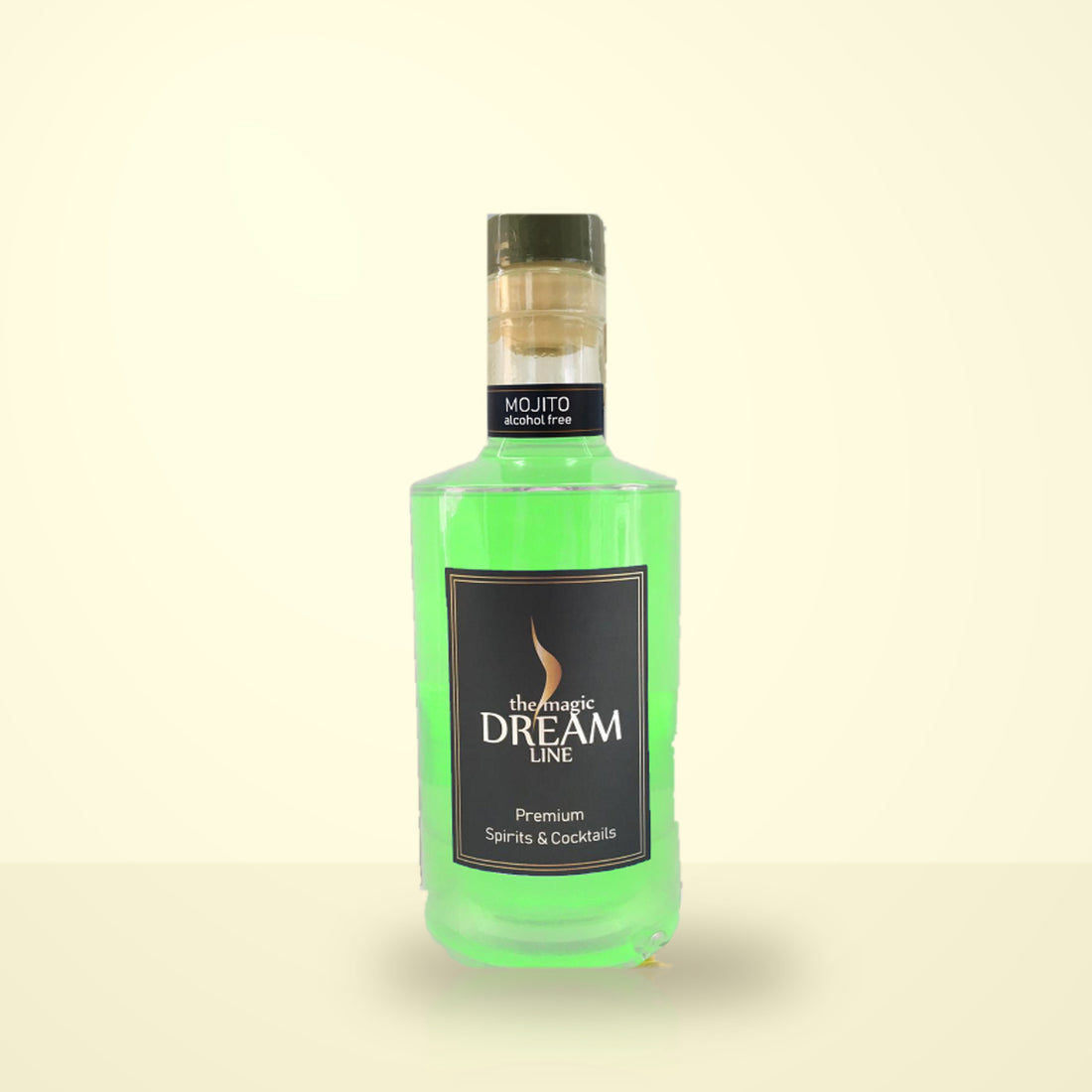 Dream Line Mojito bottle, pale green, standing on a cream studio background. The neck band reads MOJITO / alcohol free; the front label reads the magic DREAM LINE, Premium Spirits & Cocktails.