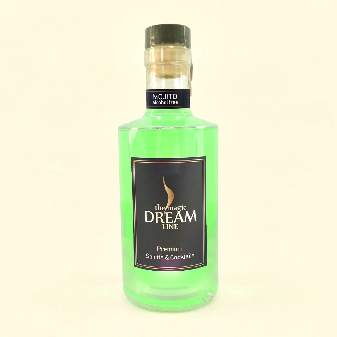 Dream Line Mojito bottle, pale green, standing on a cream studio background. The neck band reads MOJITO / alcohol free; the front label reads the magic DREAM LINE, Premium Spirits & Cocktails.
