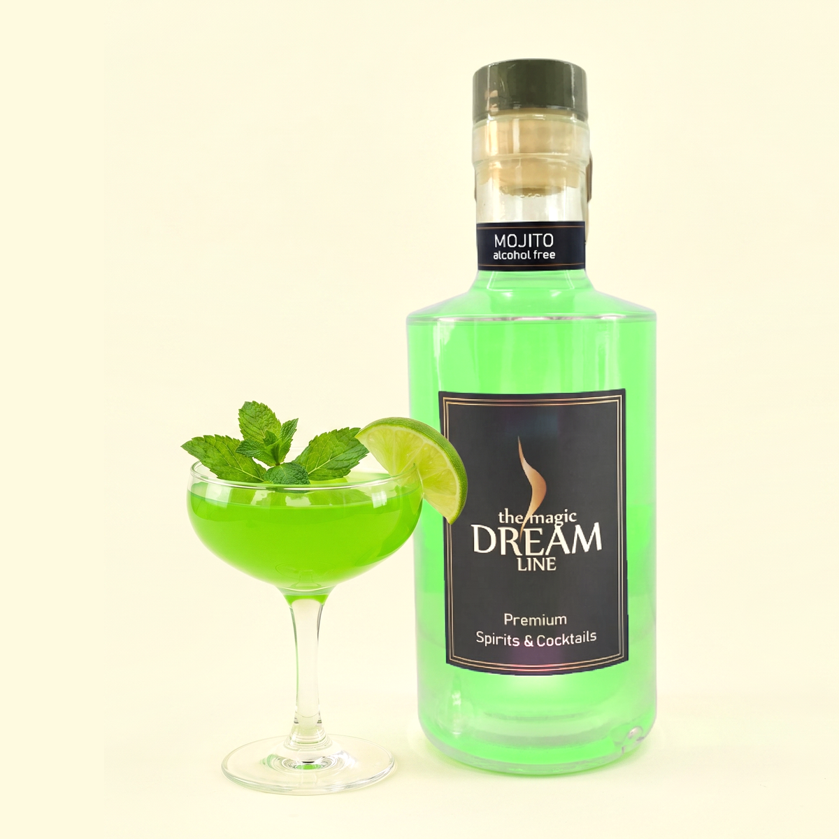 Dream Line Mojito bottle beside a coupe glass of bright green mojito with fresh mint and lime, on a cream background.