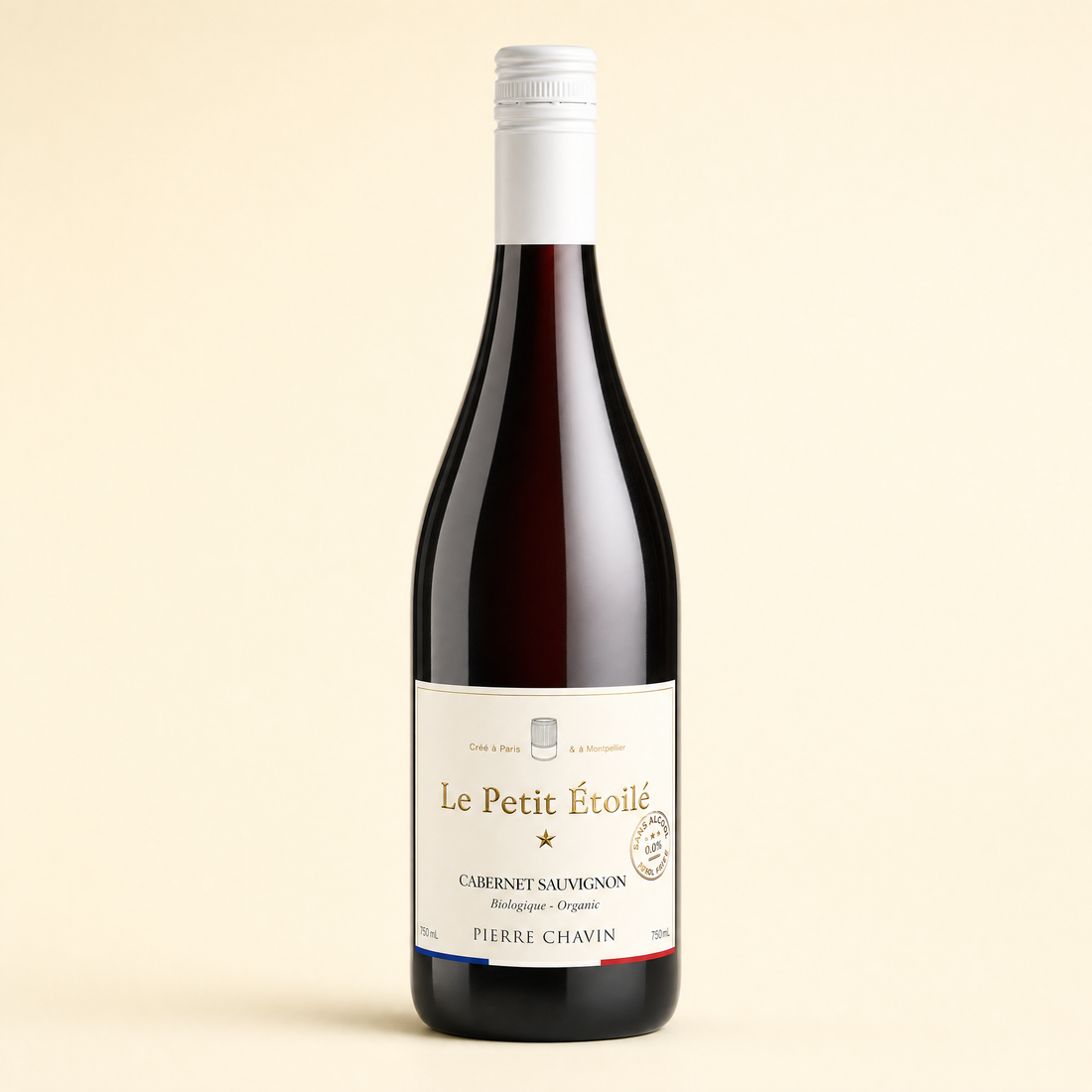 Le Petit Étoilé Cabernet Sauvignon 0.0% organic French non-alcoholic red wine bottle on a cream background