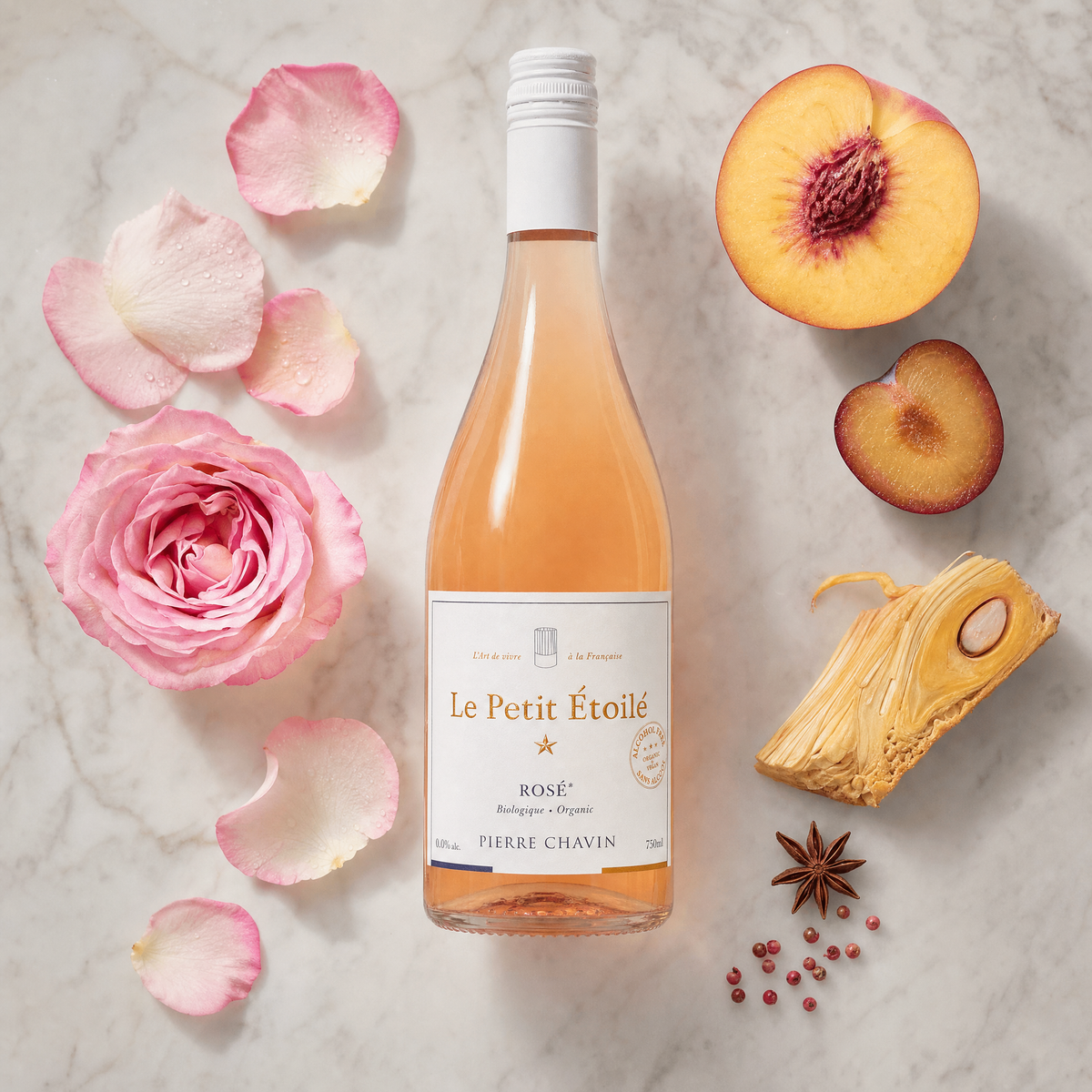 Le Petit Étoilé Rosé flatlay with rose, peach and plum tasting notes