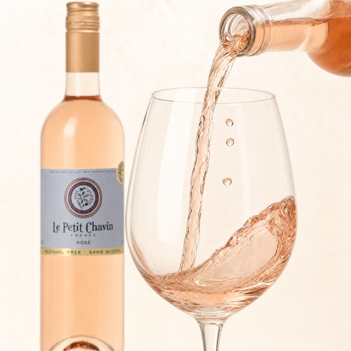 Le Petit Chavin Rosé being poured — pale pink 0.0% rosé