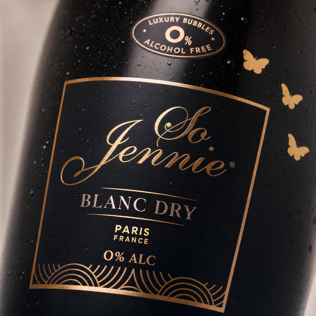 So Jennie Paris Blanc label close-up — black and rose-gold, 0% ALC