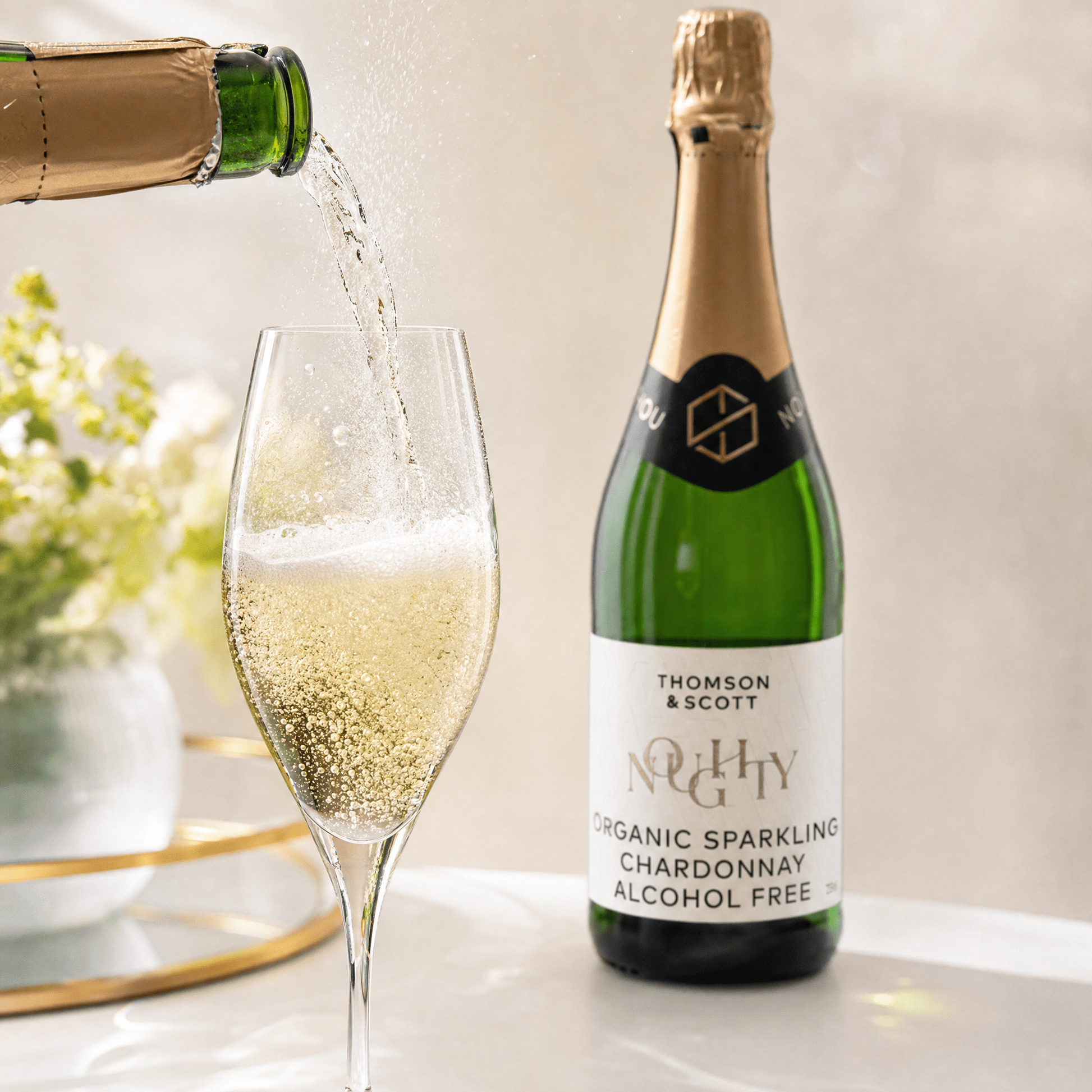 Noughty Chardonnay — pour