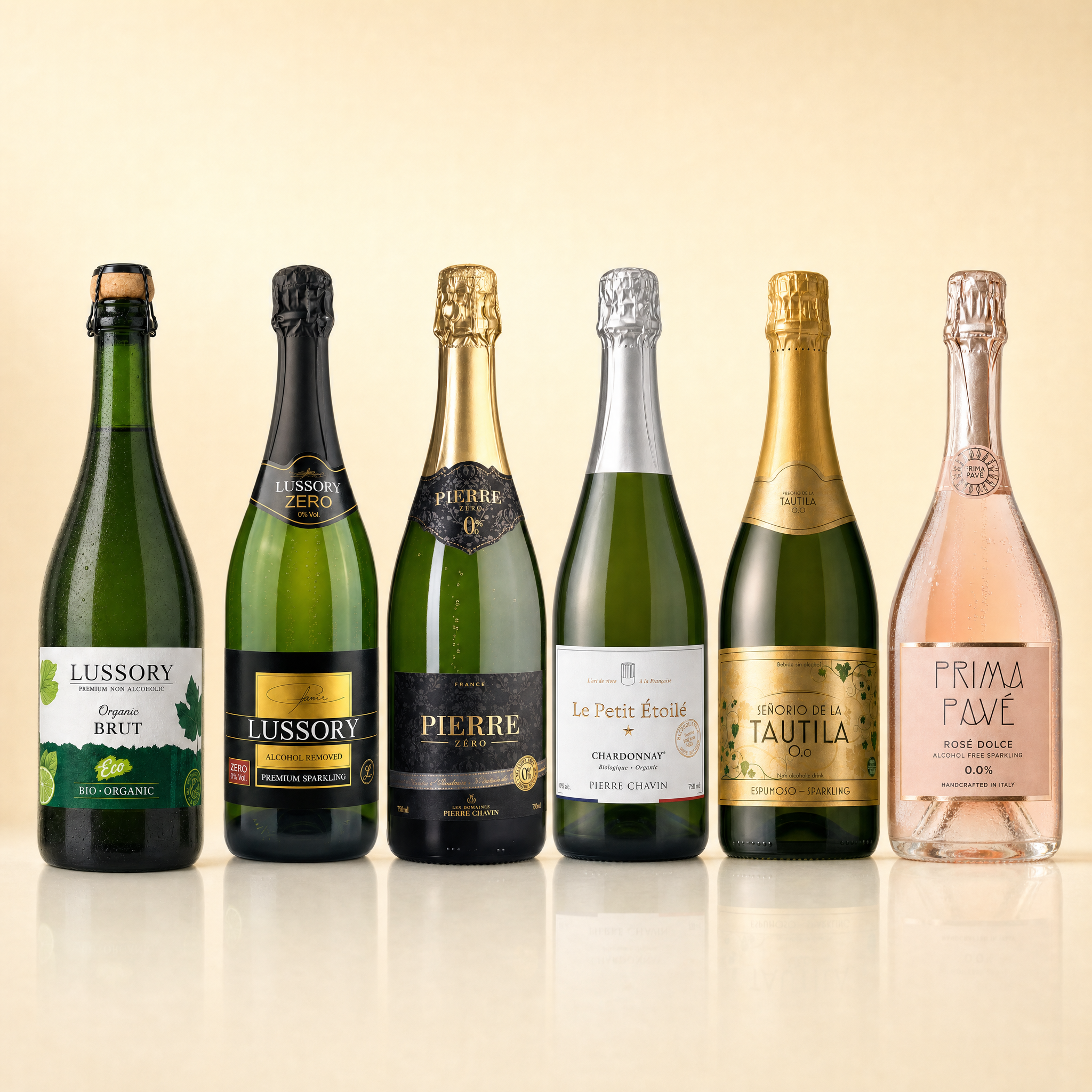 The Sparkling Six — Lussory Organic Brut, Lussory Premium Brut, Pierre Zéro Chardonnay, Le Petit Étoilé Chardonnay, La Tautila Espumoso and Prima Pavé Rosé Dolce, six 0.0% alcohol-free sparkling bottles.
