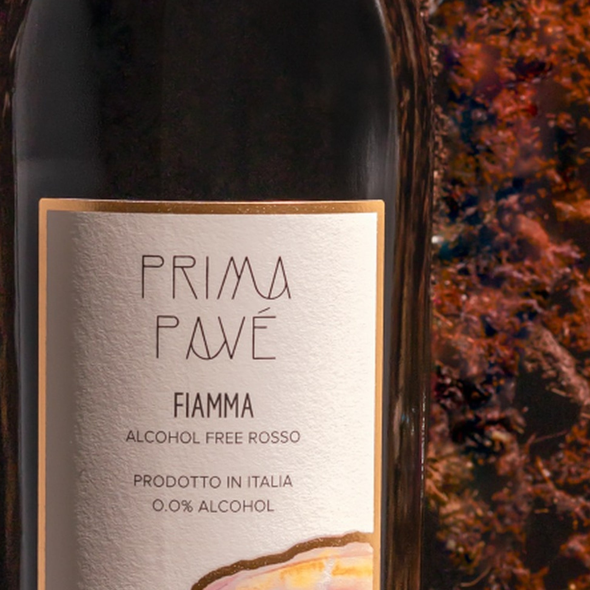 Prima Pavé Fiamma label close-up, reading FIAMMA, ALCOHOL FREE ROSSO, PRODOTTO IN ITALIA, 0.0% ALCOHOL