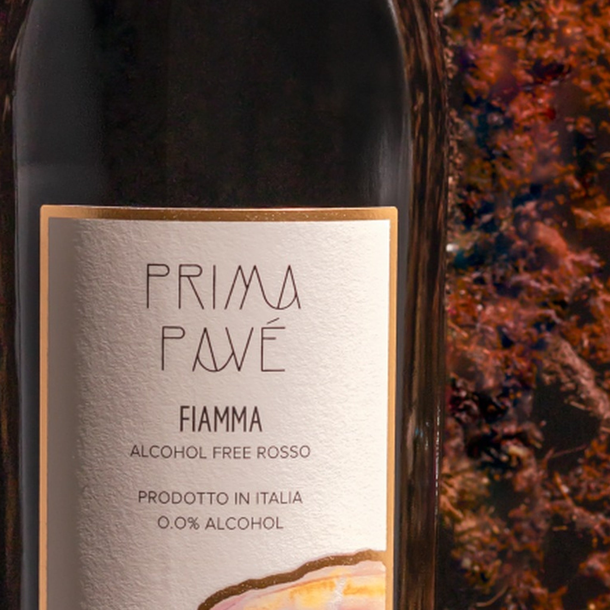 Prima Pavé Fiamma label close-up, reading FIAMMA, ALCOHOL FREE ROSSO, PRODOTTO IN ITALIA, 0.0% ALCOHOL